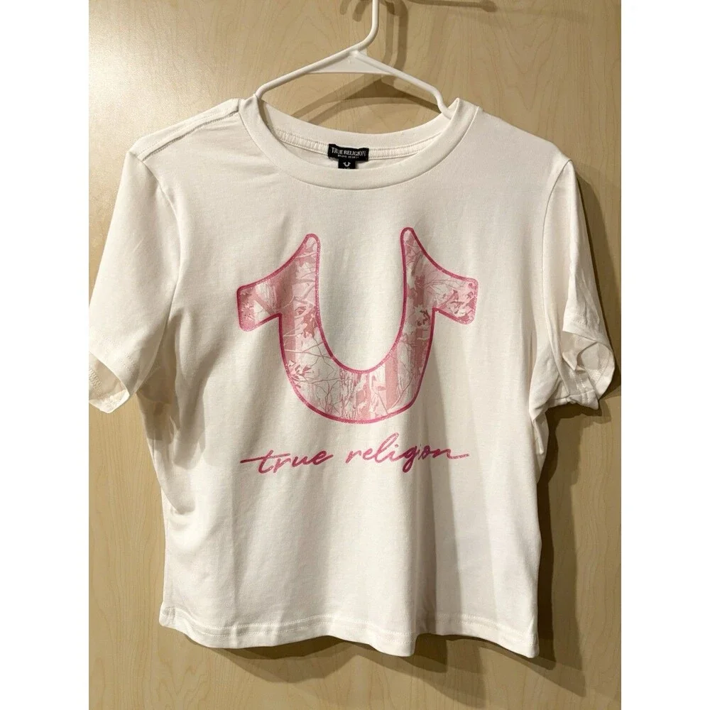 True Religion t-shirt features a pink bandana-printed horseshoe logo